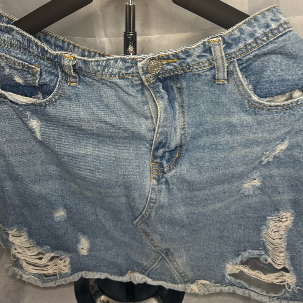 refuge Light Blue Denim Detail with Gold Stitching